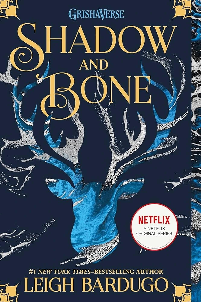 Cover of the novel "Shadow and Bone" featuring a fantasy-themed design with a central character.